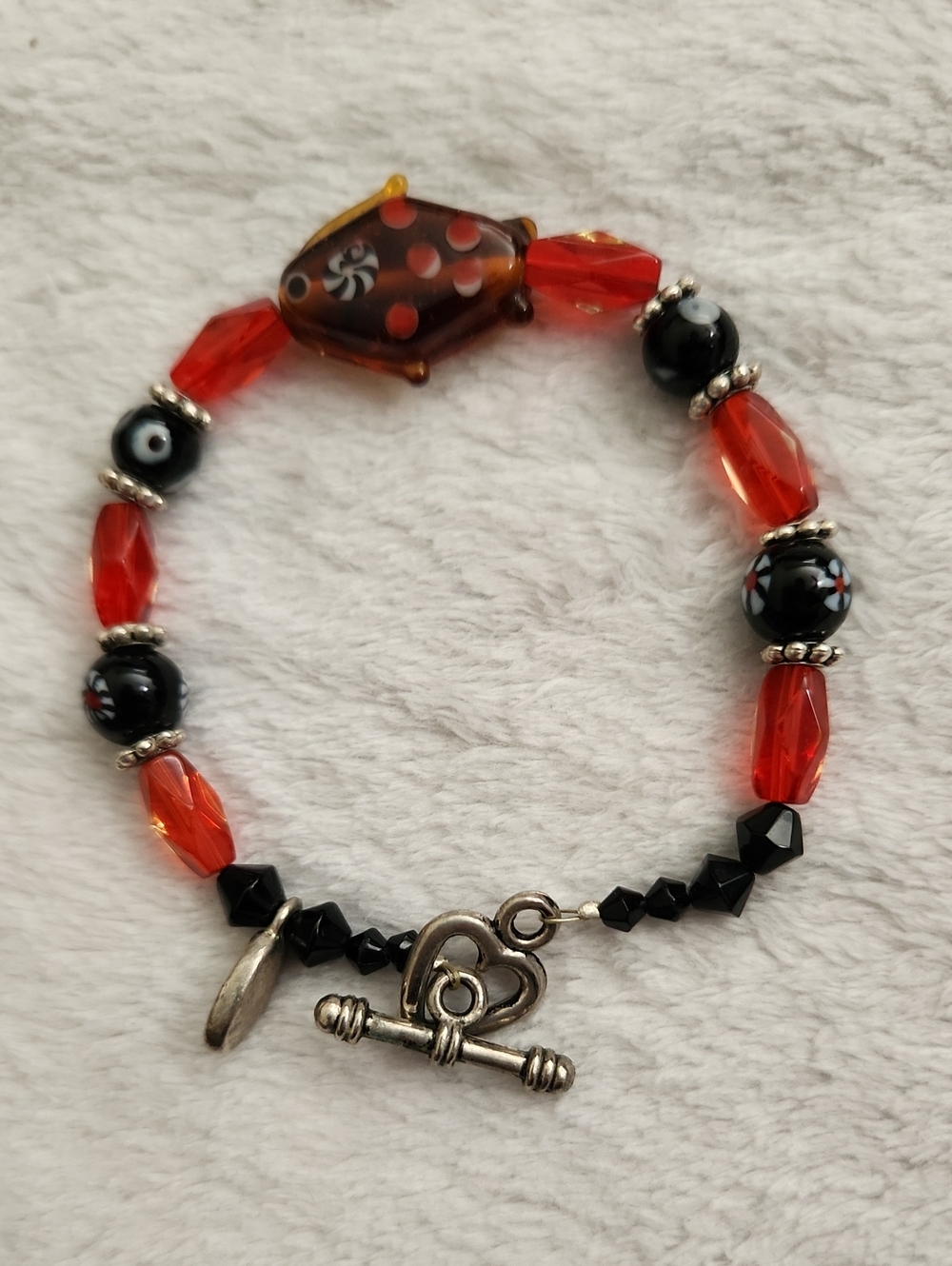 Handcrafted Red and Black Beaded Fish Bracelet